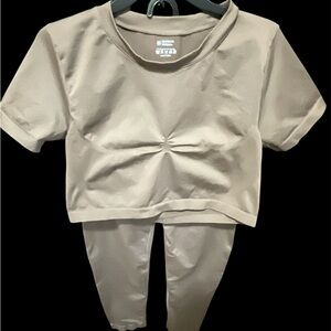 Chocolate brown Two-Piece Set crop top with high waisted leggings.